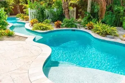 Image de A Lazy River Day & Night 4 Bedrm  w lazy river heated pool! Bikes & Beach Gear!