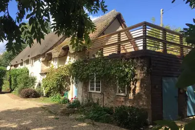 Idyllic Thatched Dorset Cottage and Bespoke Shepherds Huts