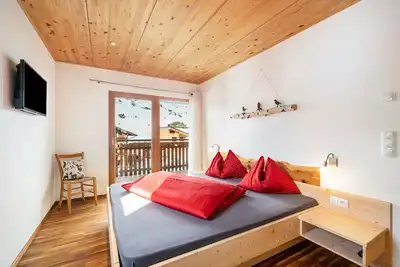 Image de Appartement de vacances \"Enzian\" dans une ferme de montagne avec balcon, jardin et sauna