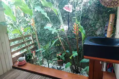 Image de Chambre indépendante et douche tropicale