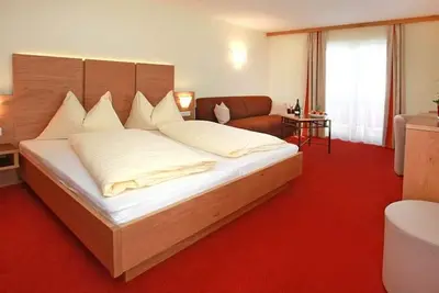 Image de Familienzimmer mit Dusche, Wc 3er Belegung - Hotel Bachschmied Kg