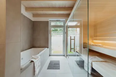 Image de Ferienhaus Strandweiss mit Sauna, Wellnesswanne, Kamin - 600m zum Strand