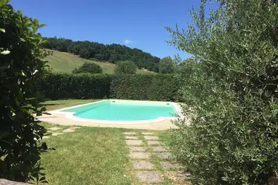 Comfort apartment in farmhouse with swimming pool