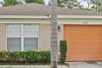 Image de Cozy home 15 mins from Disneyworld
