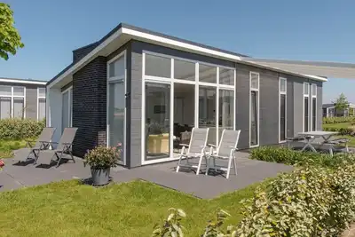 Appartement dans une maison de vacances avec Wifi, Tv, terrasse, vue panoramique, parking