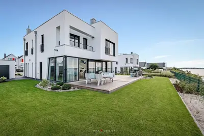 Image de Villa Seemööv - 1st row on the water, terrace, balcony, whirlpool, sauna, fireplace