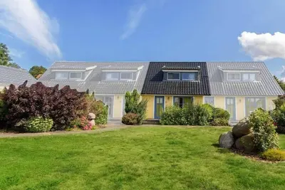 Image de Maison de vacances Neuenkirchen pour 1 - 5 personnes avec 2 chambres Ă coucher - Maison mitoyenne