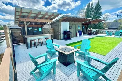 Torch Lake Sandbar Directly Across the Street With Indoor Boat Slip Unit A