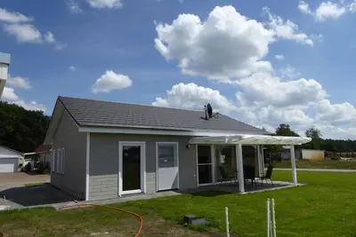 Image de Vacation home just a few hundred meters from the lake with Wlan