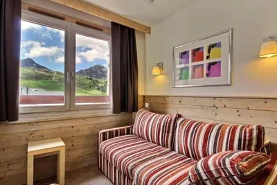 Image de Joli studio cabine pour 4 avec balcon ensoleillé et casier à skis au pied des pistes