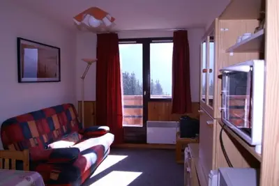 Image de Studio cabine cosy avec balcon, 400m des pistes, casier à skis, proche commerces et remontées mécaniques.