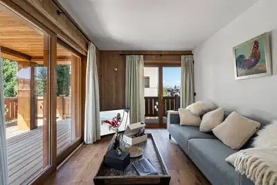 Image de Appartement élégant près des pistes, parking inclus, idéal pour familles – Courchevel Le Praz