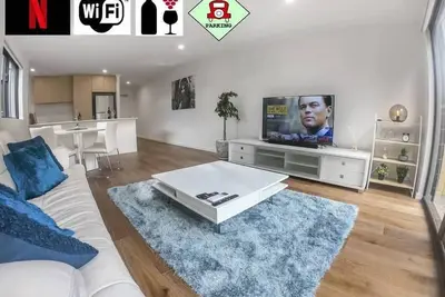 Image de 1 Bdrm Close Airport/Shops, Wifi, Netflix, Parking