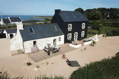 Image de La Cabane des Dunes - Maison 4* face Ă la mer avec piscine