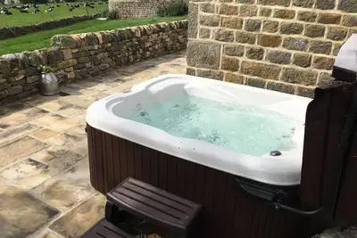 Image de Pretty cottage with enclosed patio and private hot tub with stunning veiws