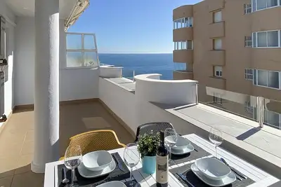 Image de Penthouse first line beach, with large terrace, bbq, pool and sea views.