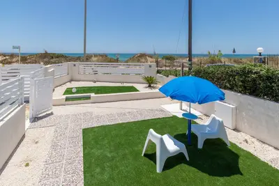 Image de Oneiro, apartment just 10 m from the sandy beach in Santa Maria del Focallo