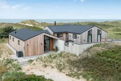 Image de Maison de vacances pour 10 a Løkken