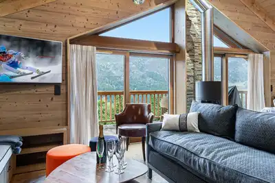 Image de Chalet moderne et cosy avec jacuzzi, sauna et parking à Méribel