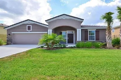 Image de Perfect Family Retreat: Villa with Pool, Spa & Lazy River – 15 Mins to Disney