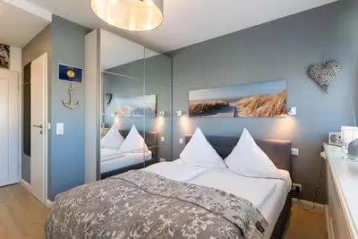 Image de Modern and central app. with balcony, parking space, Wlan. Pets allowed.