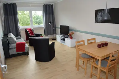 Image de Fewo with green areas, balcony, parking spaces, conveniently located, quieter than you think
