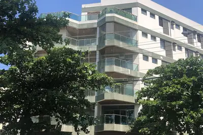 Image de Beautiful apartment 180m2 Guarujá Enseada. 3 suites, 4 bedrooms 3 min walk from the beach