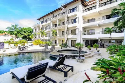 Image de Spend the winter on a quiet sandy beach! 2bd luxury condo in oceanfront resort