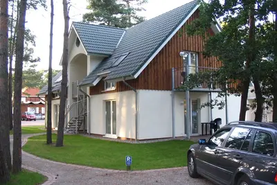 Image de Strandidyll im KĂĽstenwald vacation apartment 1 - Holiday apartment 1 (ground floor, left)