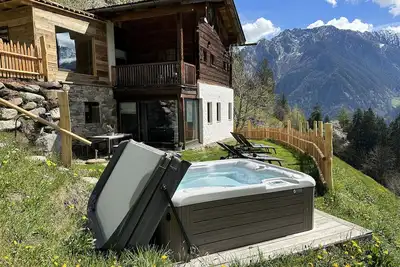 Image de Maison de vacances \"Bergchalet Obertalerhof\" avec vue sur les montagnes, balcon, jardin et Wi-Fi
