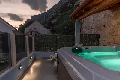 Image de Stone house Dario with Finnish sauna and an outdoor hot tub