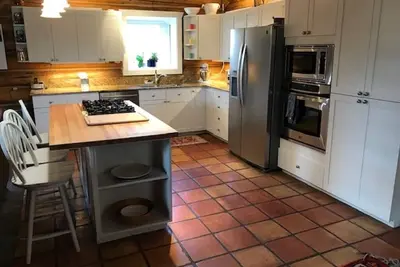 Beautiful, well-appointed, log cabin home with gracious spaces and lots of light