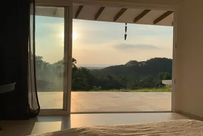 Image de House with terrace and pool.