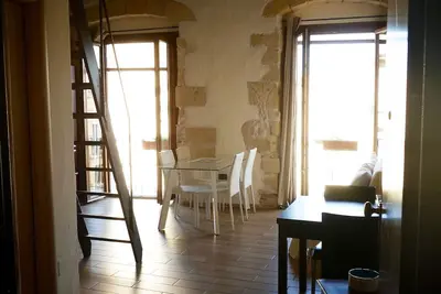 Image de Charming and bright apartment in a 1900 building (wooden roof and stone walls)