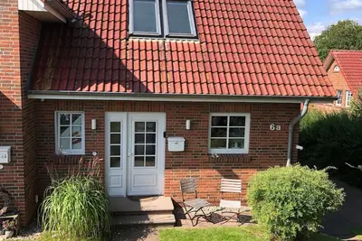 Image de Bright, quietly located vacation home, 3 min. walk from the beach