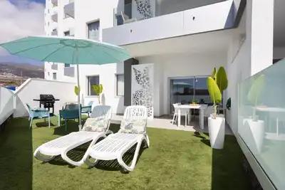 Image de Beau rez-de-chaussée avec terrasse et vue partielle sur la mer à Costa Adeje