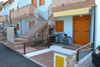 Image de Appartement en bord de mer avec piscine Ă Rosolina