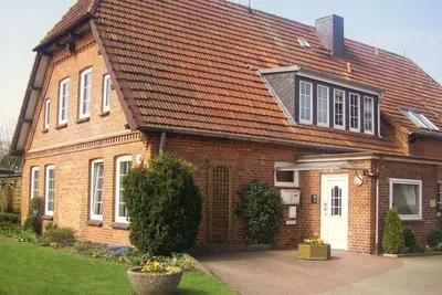 Image de Vacation apartment Niemann 1 in a former farmhouse, 15 minutes by car to the beach