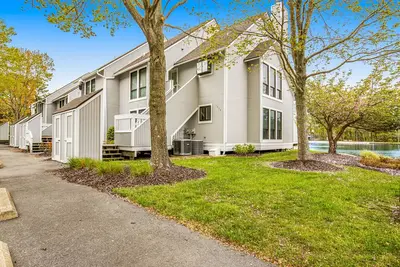 Image de Sea Colony Tennis 1st floor condo w/ gym, tennis court, and pool
