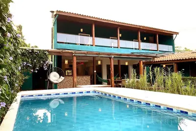 Image de Refúgio Perfeito: Conforto, Piscina e Praia!