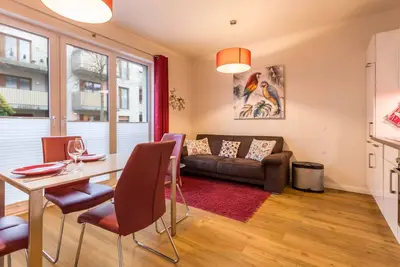 Image de Appartement de vacances moderne \"BĂĽsumperle Rot\" en situation centrale avec Wi-Fi