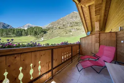 Image de Appartement \"Sonnenuntergang\" avec vue panoramique sur les montagnes, balcons et sauna