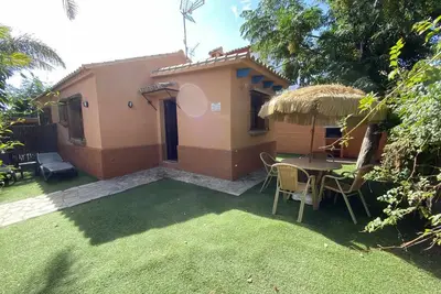 Image de House / bungalow in tourist complex with private garden and shared pool