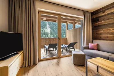 Image de Appartement \"Seebrunn - Kühberg Alm\" avec vue sur les montagnes et le lac