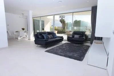 Villa Flamingo Resort with a heated pool and ocean view