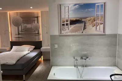 Image de Appartement-Supérieure-Salle de bain privée séparée-Vue sur Jardin-Zimmer 102