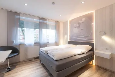 Image de Appartement-Salle de bain privée séparée-Vue sur Jardin-Zimmer 202