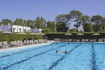 Image de Joli appartement pour 4 personnes avec climatisation, Wifi, piscine, Tv et parking