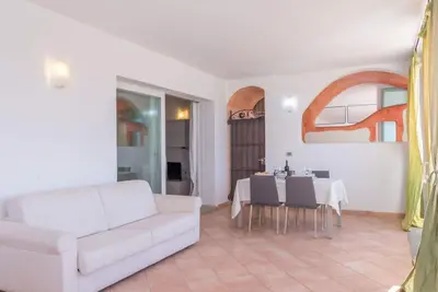 Image de Confortable appartement avec climatisation, bain à remous, Tv, terrasse, animaux admis et parking