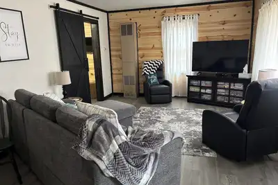 Image de Bring Your Snowmobiles & Fishing Poles \nTO This 2-Bedroom Cabin By The Lake!